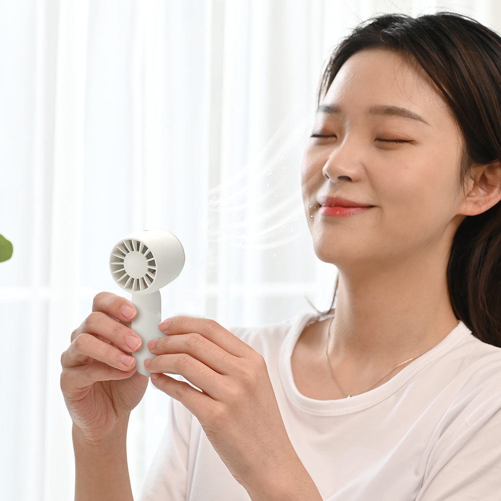 2025Stylish New ABS Standing Noise Reduction and Energy Saving Long-Lasting Durable Electric Personal Handheld Mini Portable Fan